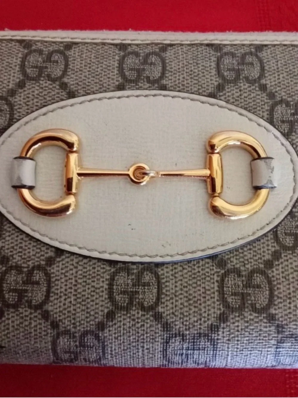 Gucci GG Supreme 1955 Horsebit crossbody wallet with gold accents